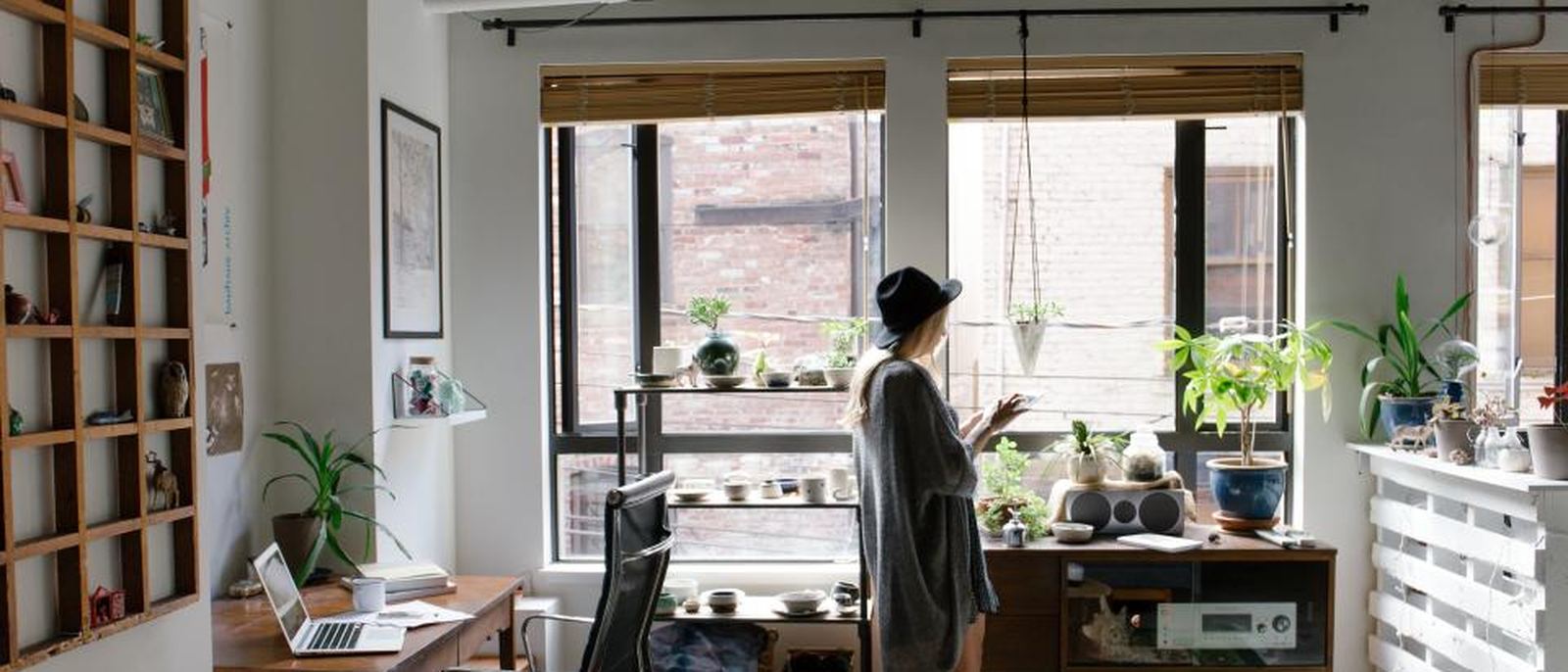 A bright modern office interior with desks and daylight